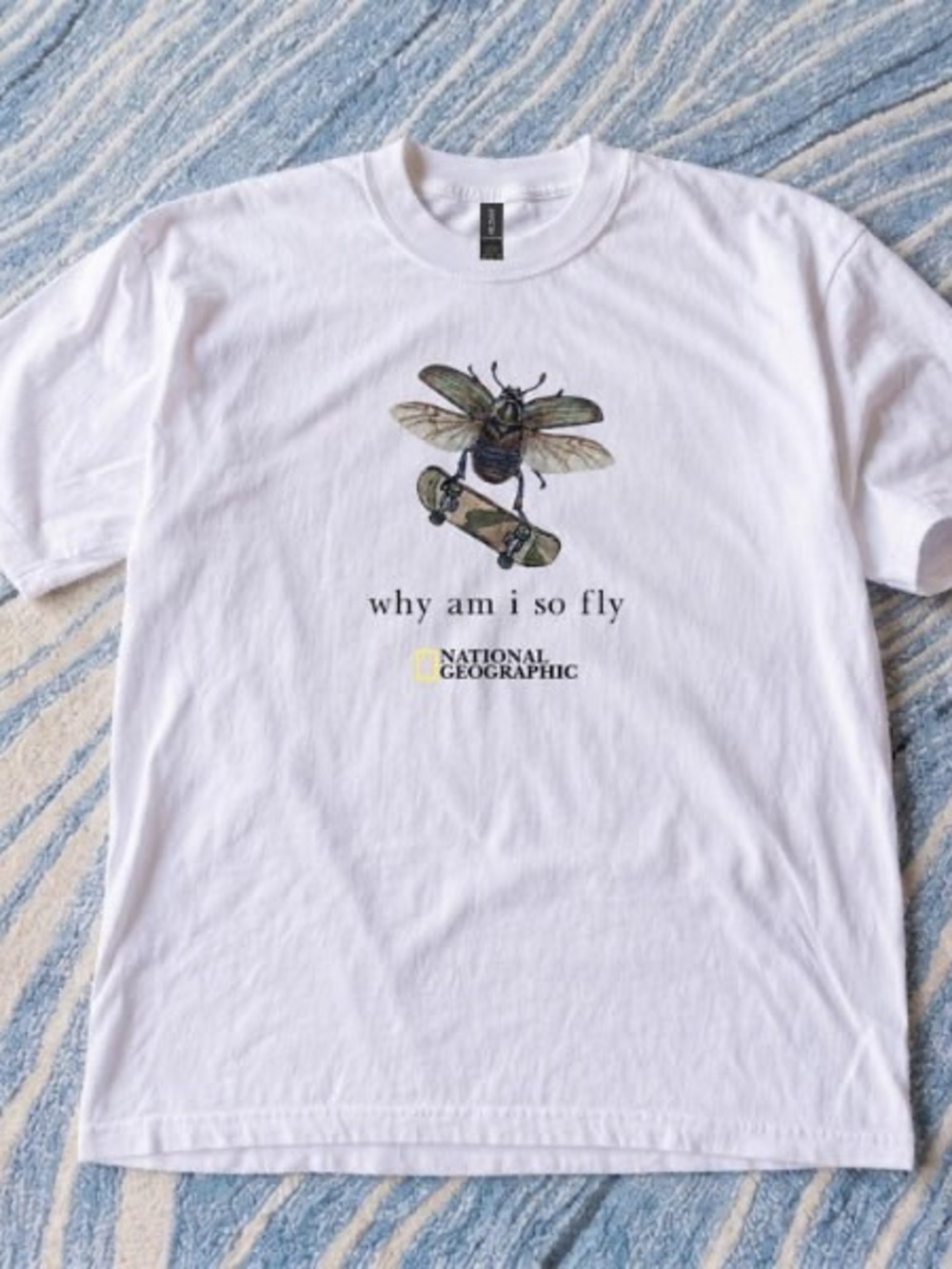 National Geographic White Tee with Insect Skateboard Graphic tee